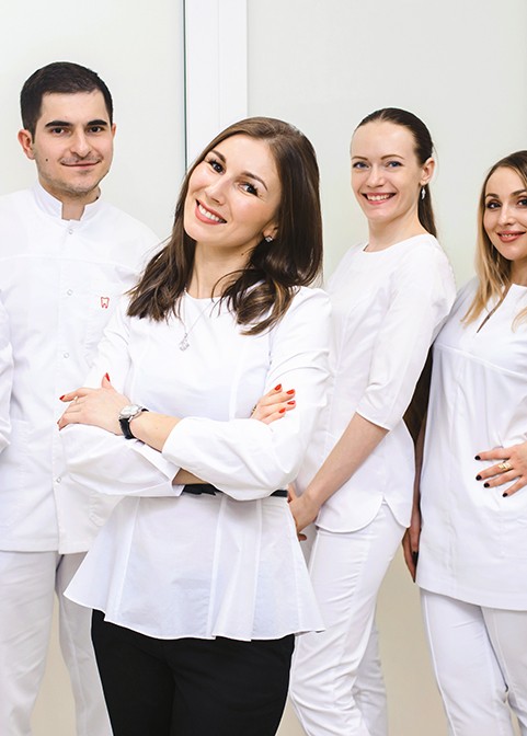 Older couple smiling and laughing after a visit to a United Concordia dentist in Morgan Hill